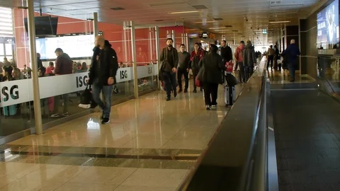 Passengers going to Gate at Airport, from Automatic Track Stock Footage 89607700