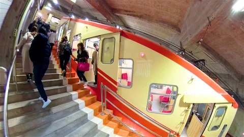 Passengers going out of the cable train in Japan Stock Footage 129276485