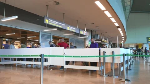 Passengers going through the security line at the Valencia, Spain Airport. Video stock 62340768