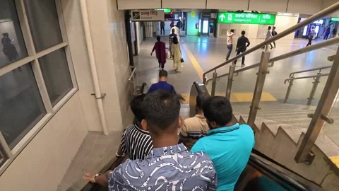 Passengers Going Upstairs on Escalator at Dhaka Metro Station Stock Footage 341860623