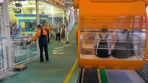 Passengers inside the capsule of the ferris wheel in Osaka Japan Stock Footage 129275538