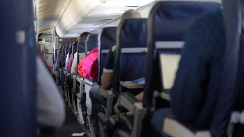 Passengers Inside Commercial Airplane Stock Footage 75323963