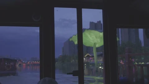 Passengers Inside Cruise Boat Looking at Night Cityscape Ji'an Stock-Footage 343590029