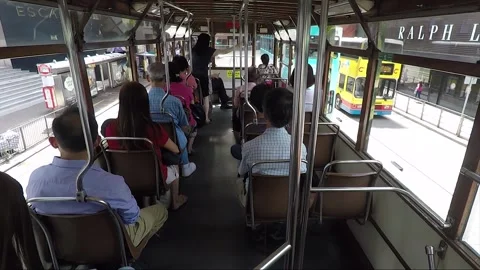 Passengers inside Double Deck Tram, Road Traffic, Wan Chai Street, Hong Kong Stock Footage 259650808