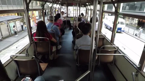 Passengers inside Double Deck Tram, Road Traffic, Wan Chai Street, Hong Kong Stock Footage 259650813