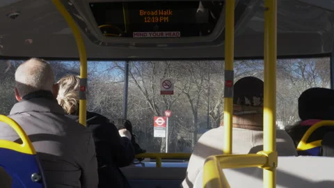 Passengers Inside Double Decker Bus With Yellow Handrails During Daytime, London Stock-Footage 327367187
