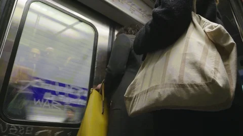 Passengers inside driving Paris Metro - Subway Train interior Stock Footage 100879256