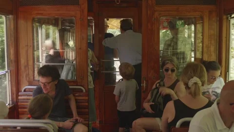 Passengers Inside Historic Sassi Superga Tramway Carriage in Turin, Italy Stock Footage 342855689