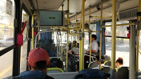 Passengers inside a metropolitan bus waiting for the green light. Video stock 23194255