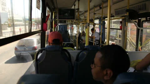 Passengers inside a moving metropolitan bus in Porto Alegre, Brazil. Video stock 23194442