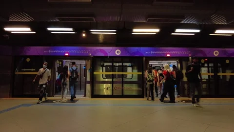 Passengers inside a wagon stopped on the platform of a subway station Stock Footage 233393589