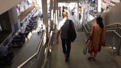 Passengers leave metro station in India Stock Footage 83204795
