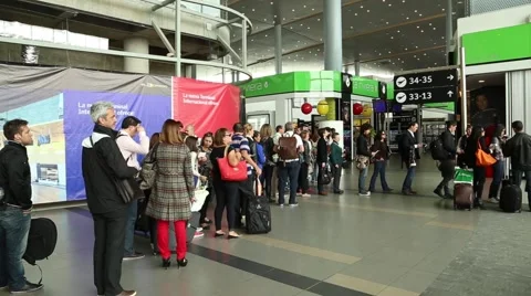 Passengers move to do the check in in Eldorado Airport Stock Footage 40529174