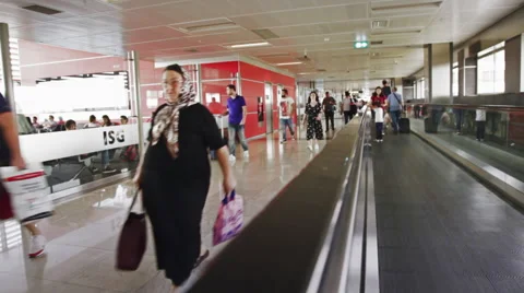 Passengers moving between gates inside Airport - Automatic Track. Stock Footage 68986205
