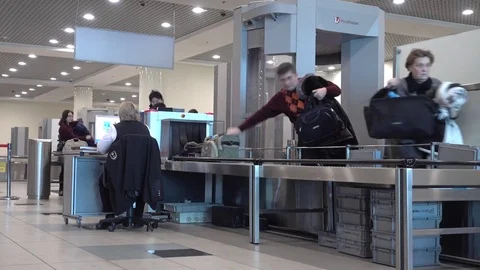Passengers pass security checks at Domodedovo airport Video stock 70247071