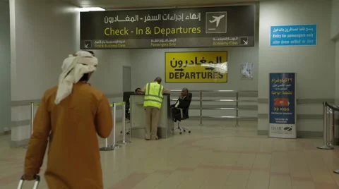 Passengers Pass With Their Luggage In Terminal Stock Footage 62202039