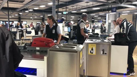 Passengers passing security check point at the Frankfurt airport Stock Footage 143125238
