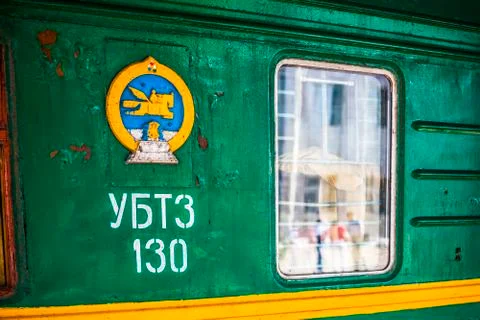 Passengers on a passing train Stock Photos