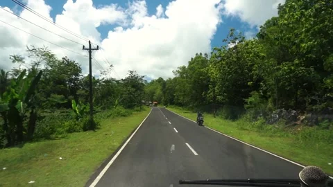 A passenger's perspective on a bus heading to the beach in Yogyakarta. Stock Footage 325441239