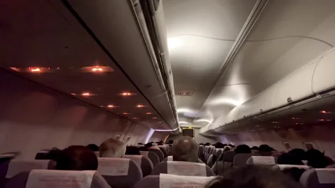 Passengers on the plane are sitting ready to take off Stock Footage 260776423