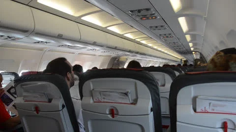 Passengers in a plane during the flight Stock Footage 22779557