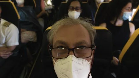 Passengers on the plane Stock Photos