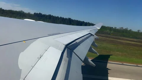 Passengers Point Of View of aircraft wing during takeoff. Germany, Frankfurt Stock Footage 184443520