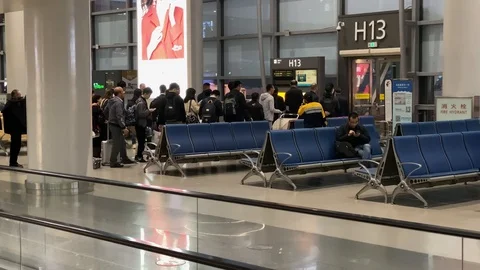 Passengers prepare to board at the gate of Xi'an Airport 스톡 동영상 121003748