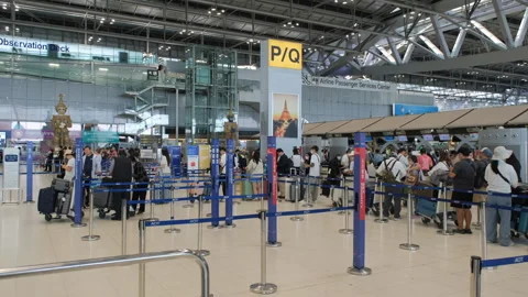 Passengers queue for check in Airport terminal Video stock 333102433