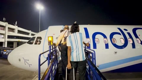 Passengers queue at the runway to board a flight during peak hours. Stock Footage 242765088