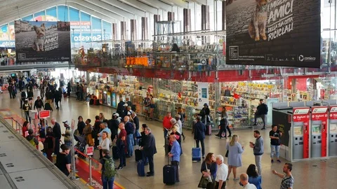 Passengers on queue at ticket office  at Roma Termini Railway Station Stock Footage 91837724