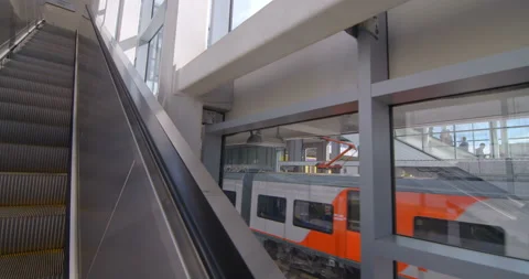 Passengers ride on the escalator up to the station of the ground metro Stock Footage 119638174