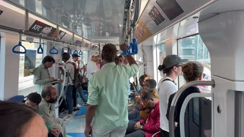 Passengers ride in a train carriage of the Dubai metro. Dubai UAE 30 August 2026 Video stock 344874231
