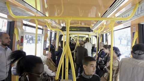 Passengers riding bus - straphangers standing - commuters Paris France Europe Stock-Footage 93815796