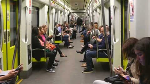 Passengers riding inside a Metro Subway Train in Europe Stock-Footage 63255284