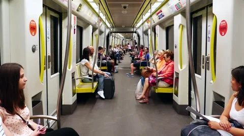 Passengers riding on a Metro train Stock Footage 63525810