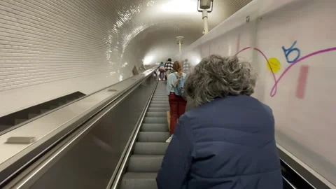 Passengers Riding Underground Escalator Out of Lisbon Metro Station, Portugal Stock Footage 340816184