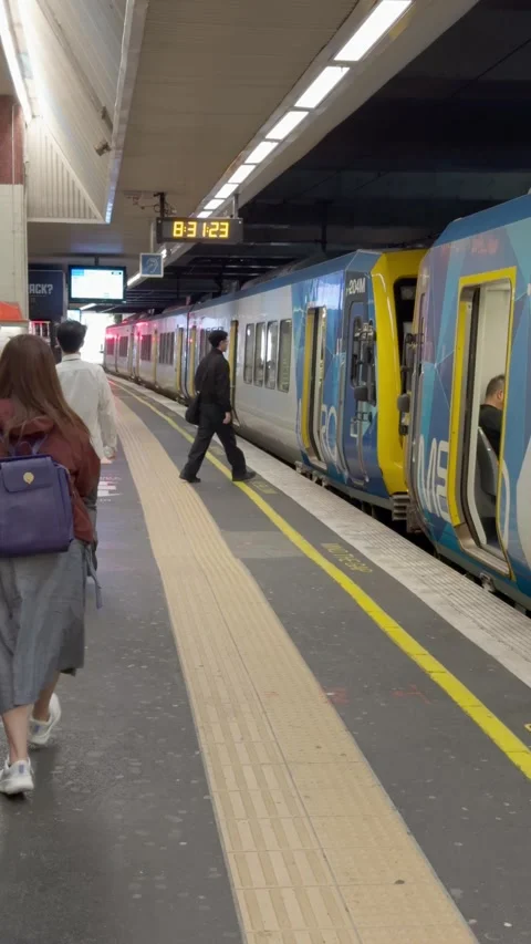 Passengers Rush to Board Metro Train at Box Hill Station Video stock 323493487