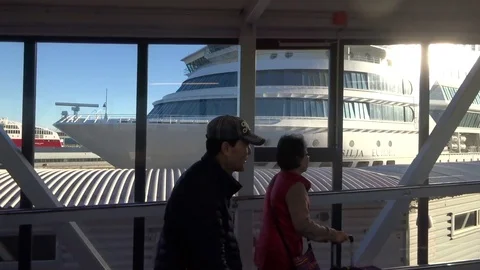 Passengers rush on a closed ladder - the ferry came to the port Stock Footage 94820871