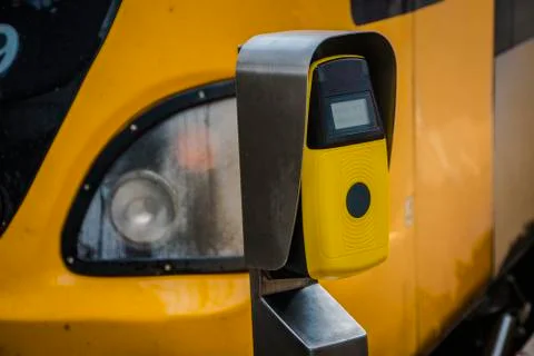 Passengers rush to the train, validate tickets, fare, public transport. Stock Photos