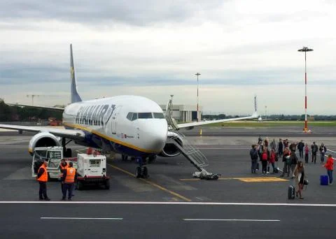 Passengers at Ryanair airplane Stock Photos