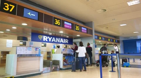 Passengers at a Ryanair Check-in Counter Stock-Footage 62341111