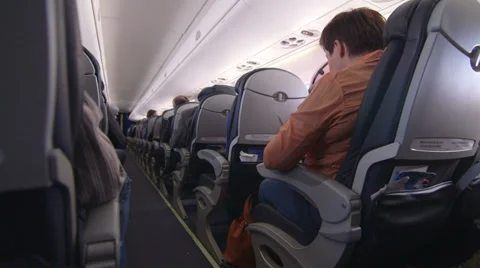 Passengers seated on the plane Video stock 32966243