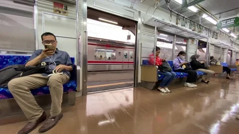 Passengers seen inside of Jakarta KRL train at Train station, Jakarta Vídeo Stock 288106599