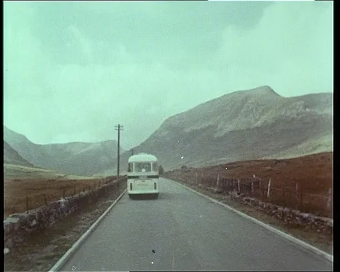Passengers sitting inside coach, talking and watching surroundings, 1965 Stock Footage 132328521