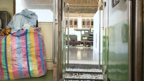 Passengers Sitting Inside Old Commuter Train in Bangkok 動画素材 324350915