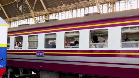 Passengers Sitting Inside Stationary Commuter Train in Bangkok 動画素材 324688893