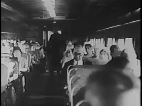 Passengers sitting in train while conductor checks tickets Video stock 260256600