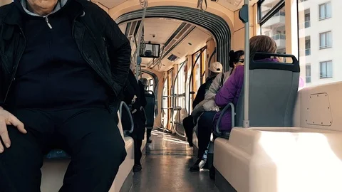 Passengers sitting in tram at day time Stock Footage 96910791