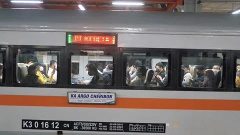 The passengers train are waiting for the train to start leaving Bekasi station Stock Footage 221394639